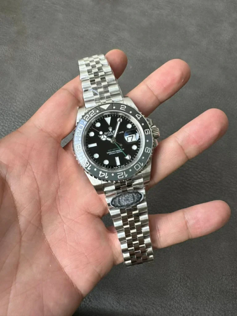 Clean Factory Rolex GMT-Master II 126710GRNR 40mm DD3285 Superlumed black dial and hands in correct blue color Jubilee bracelet